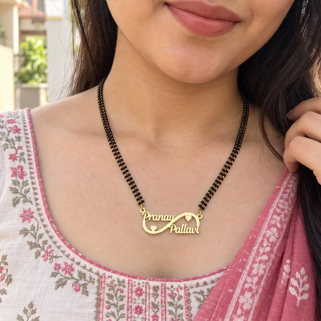 Double Heart Infinity Couple Name Necklace – With a black-beaded chain shown on a model Double Heart Infinity Couple Name Necklace with a black-beaded chain shown on a model