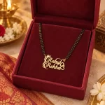 Stylish Couple Name Necklace with a black-beaded chain in a red display box