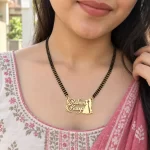 Couple Design Name Necklace with a black-beaded chain shown on a model