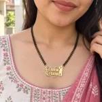 Romantic Couple Design Name Necklace with a black-beaded chain shown on a model