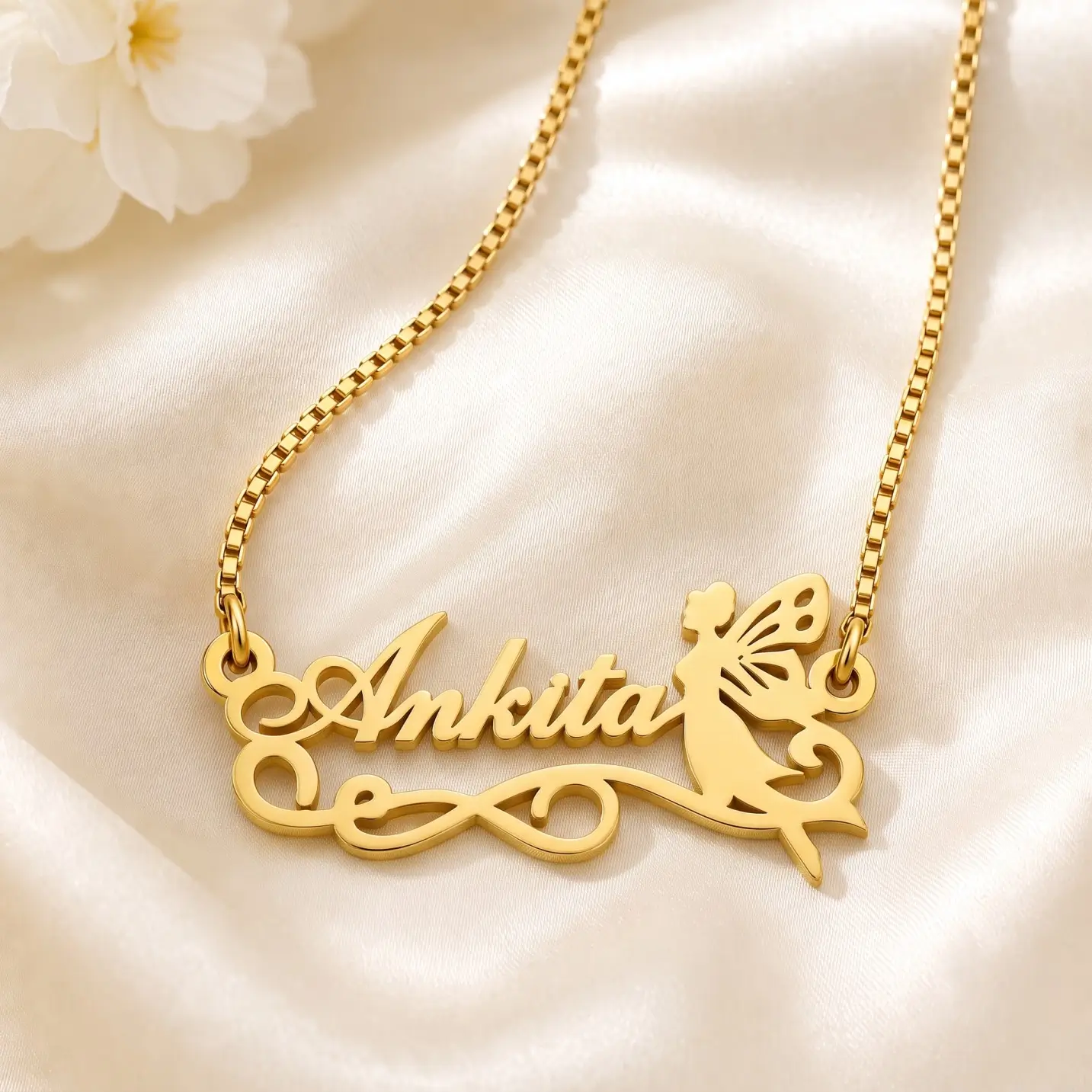 Fairy Angel Name Pendant – Satin Detail Gold-tone fairy silhouette name pendant on ivory satin