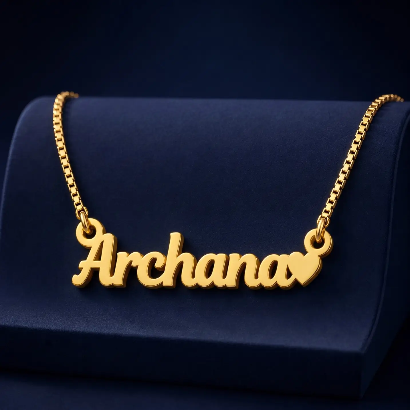 Simple Heart Name Pendant – Velvet Display Gold-tone simple name pendant with a small heart on a navy velvet display