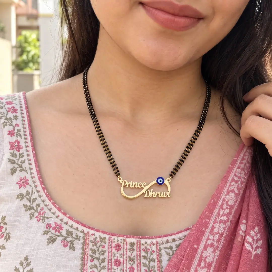 Blue Evil Eye Infinity Couple Name Necklace – With a black-beaded chain shown on a model Blue Evil Eye Infinity Couple Name Necklace with a black-beaded chain shown on a model