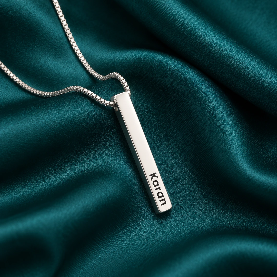 Personalized Silver Finish 3D Bar Pendant – On dark green fabric Personalized Silver Finish 3D Bar Pendant on dark green fabric
