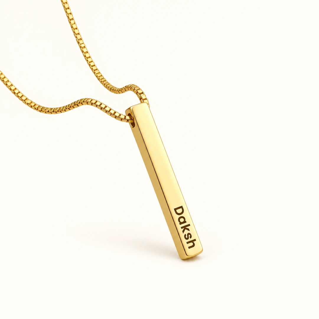 Personalized Golden 3D Bar Pendant – On an cream background Personalized Golden 3D Bar Pendant on an cream background