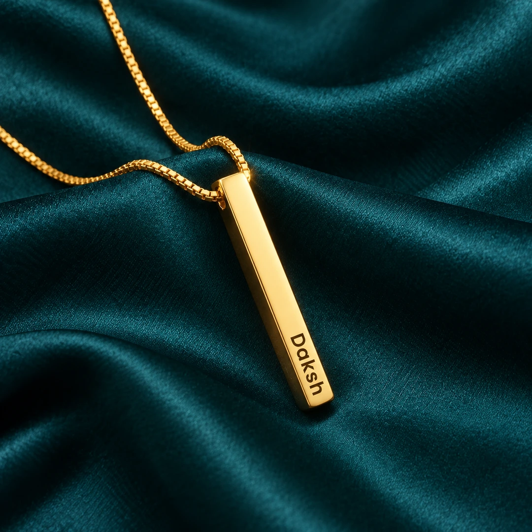 Personalized Golden 3D Bar Pendant – On dark green fabric Personalized Golden 3D Bar Pendant on dark green fabric